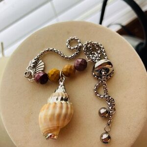 Elegant Shell Charm Bracelet with Silver Accents